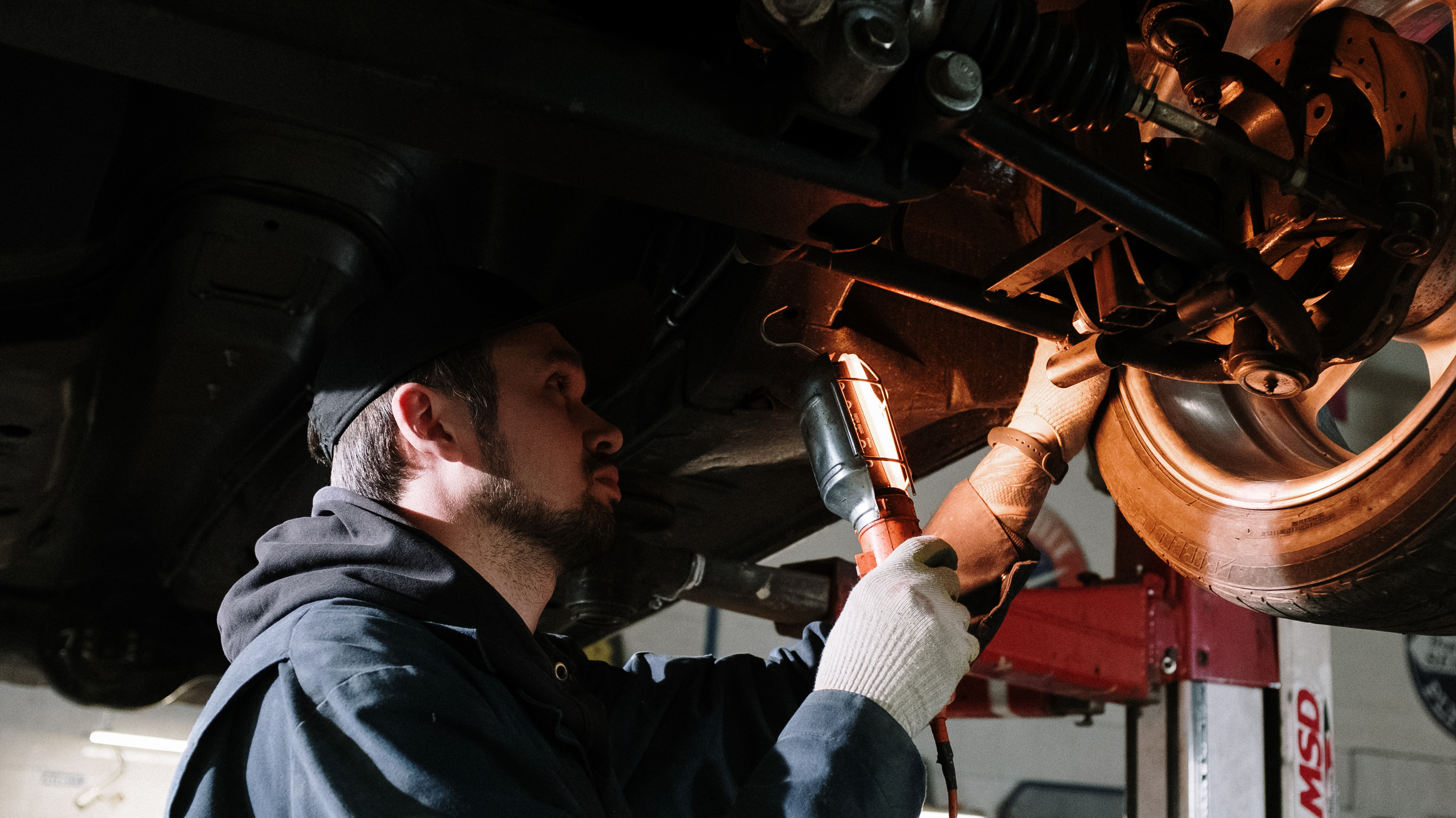 car mechanic fixing carr